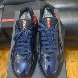 Prada Americas Cup Size 10 UK which is 11 US these run a size big